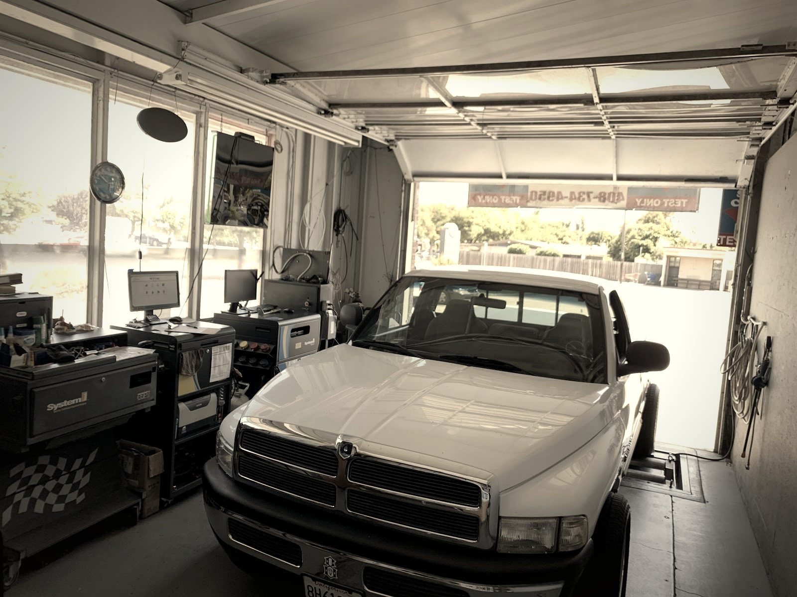 Inside the bays at Zip In Auto, Campbell